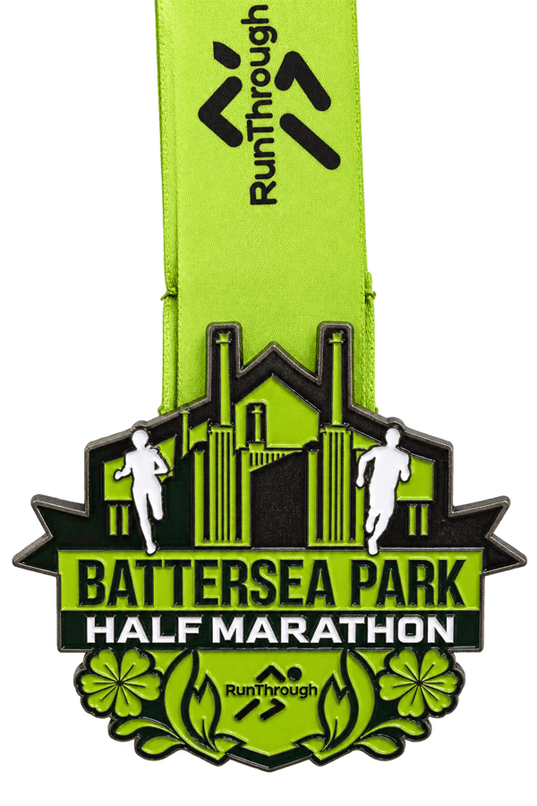 Green Battersea Park Half Marathon medal with Battersea Power Station