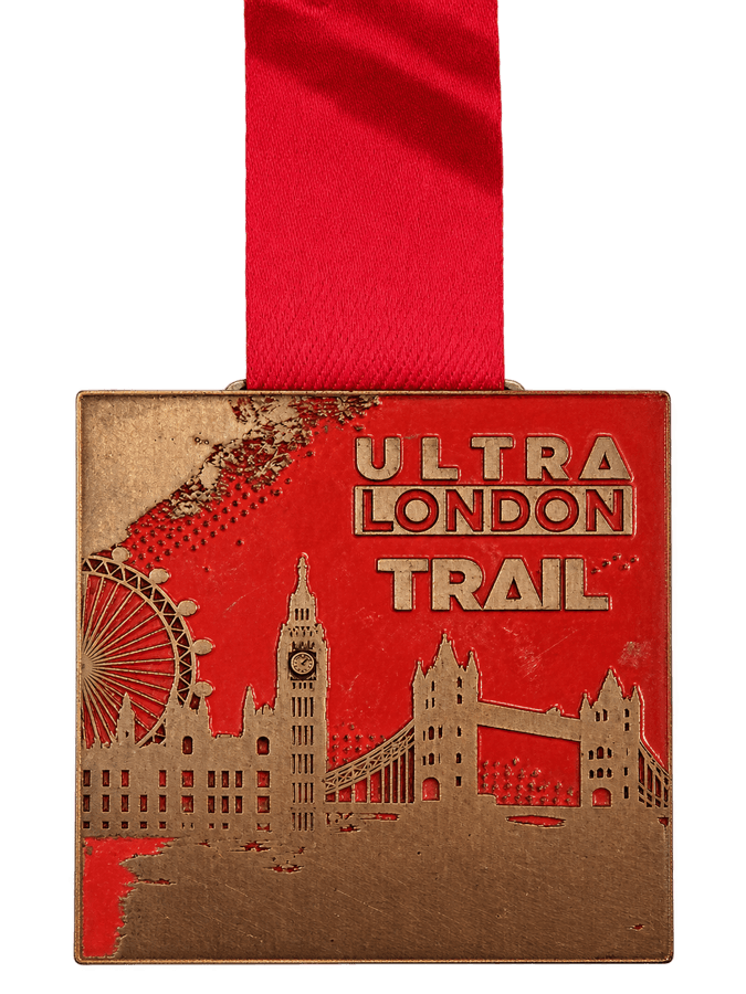 Red Ultra London Trail medal engraved with the London skyline