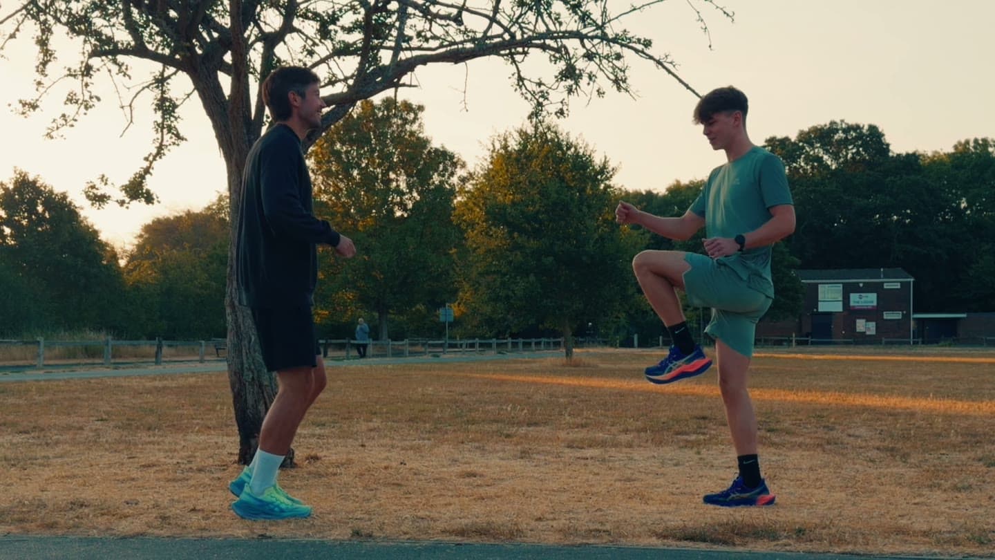 Sam coaching Callum during an outdoor running session