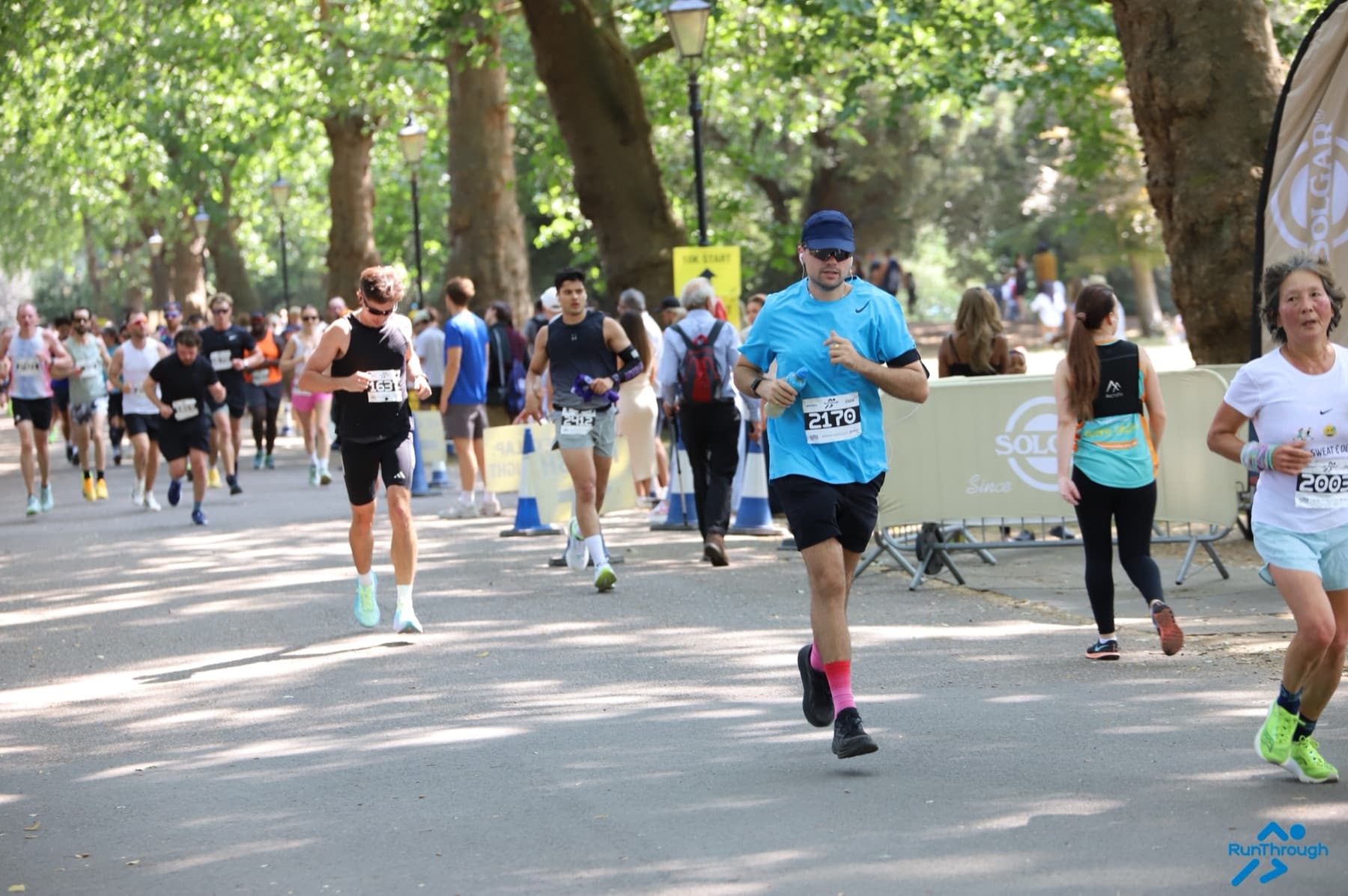 Sam checking his watch during the Battersea Half Marathon